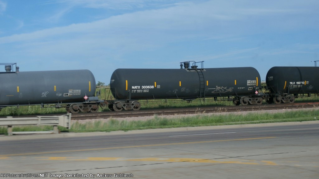 NATX 303638 & 2 Tank Cars Between